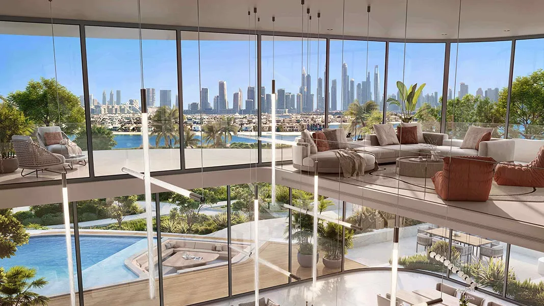 Pool deck with glass railings and palms